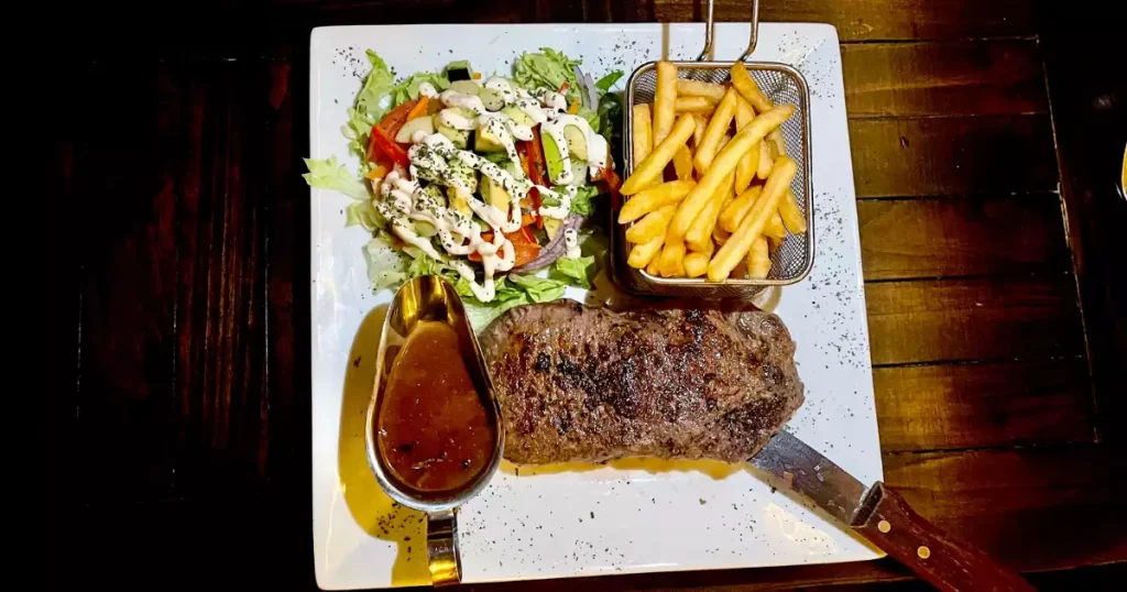 Grilled to perfection at SXM steakhouses in Sint Maarten, Simpson Bay, featuring juicy premium steaks, flavorful sides, and a memorable dining experience near the marina.