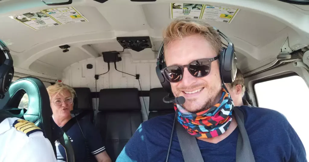 SXM helicopter tour in St. Maarten offering scenic aerial views of beaches, coastline, and island landmarks near Simpson Bay