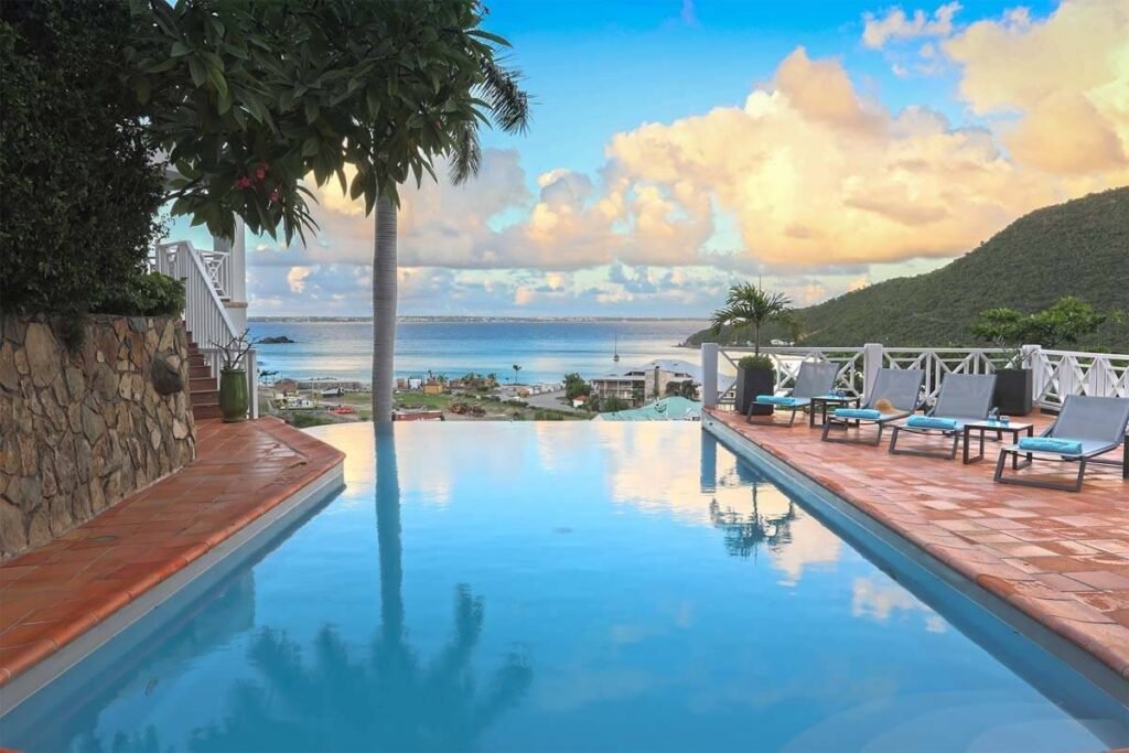 Casa Branca in St. Martin offering luxury villa accommodations, private terraces, and stunning ocean views near Grand Case for travelers seeking upscale stays.