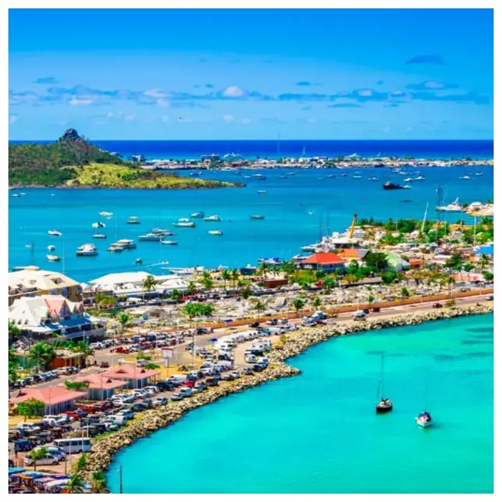 Scenic view of Marigot and Nettle Bay in St. Martin showcasing beaches, waterfront dining, and popular tourist attractions for visitors exploring the island.